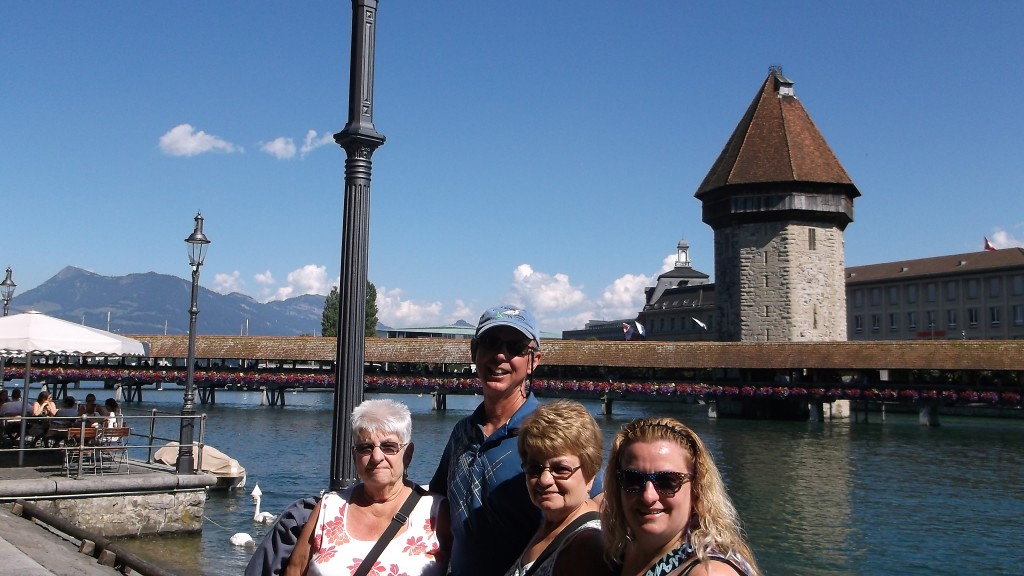 in Lucerne, covered bridge from the 1400's behind us